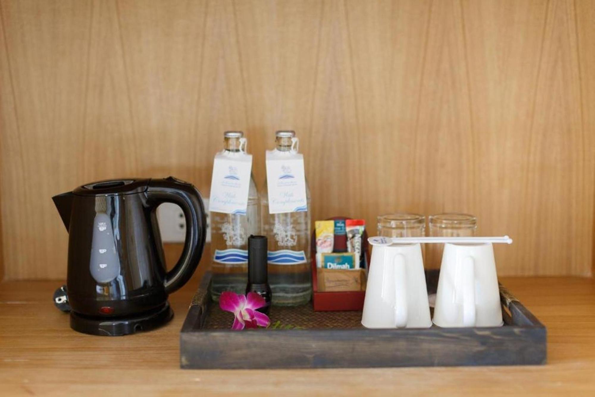 Namaka Resort Kamala Exterior photo A kettle and bottled water in a hotel room